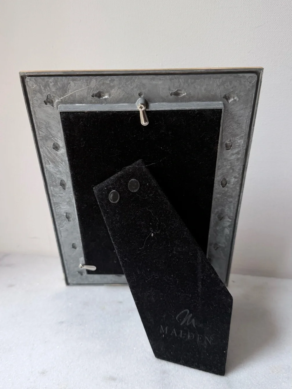 White metal decorative picture frame with gold accents